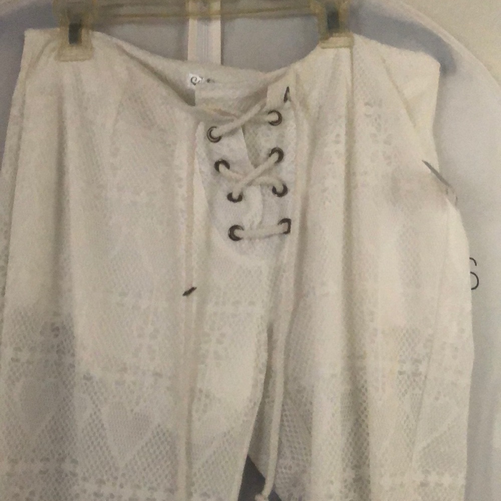 Stretchy see thru pants with heart print detail.